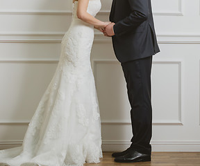 Image showing Elegant bride and groom posing together
