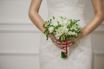 Image showing Beautiful wedding bouquet in hands