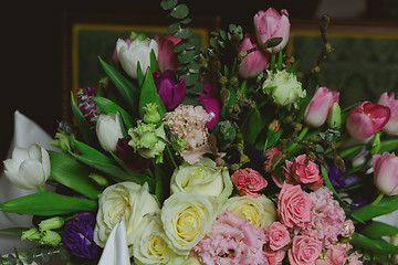 Image showing Beautiful flowers on table