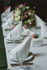 Image showing Beautiful flowers on table