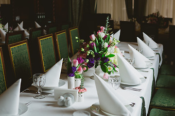 Image showing Beautiful flowers on table