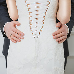 Image showing Elegant bride and groom posing together