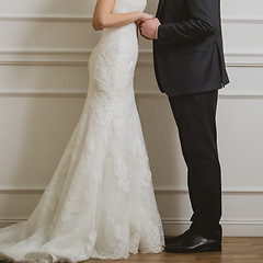 Image showing Elegant bride and groom posing together
