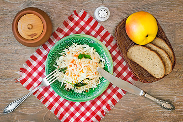 Image showing Salad from fresh cabbage in the ceramic plate.