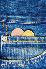 Image showing Coins in pocket jeans