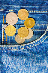 Image showing Coins and pocket jeans