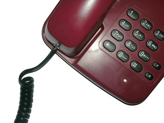 Image showing Brown telephone with cord