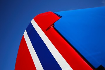 Image showing Red white and blue tail rudder.