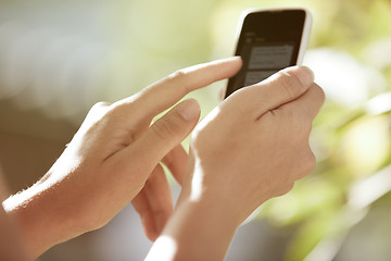 Image showing Hands with smartphone