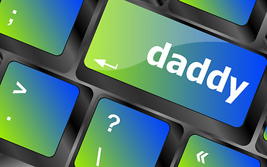 Image showing daddy message on a white computer keyboard