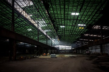 Image showing Large industrial hall with low light