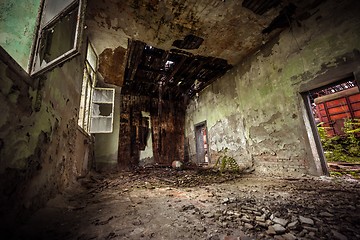 Image showing Dark room interior with damaged roof