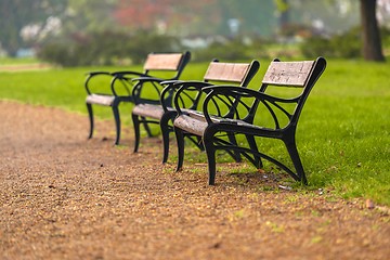 Image showing Stylish bench in autumn park