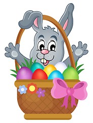 Image showing Basket with Easter eggs and happy bunny