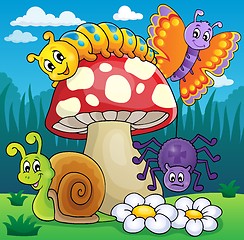 Image showing Toadstool with animals on meadow