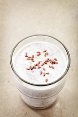 Image showing Glass of greek yogurt with crushed flax seeds