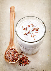 Image showing Glass of greek yogurt with crushed flax seeds