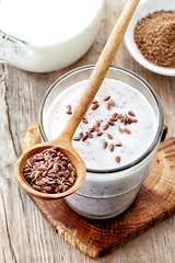 Image showing Glass of greek yogurt with crushed flax seeds