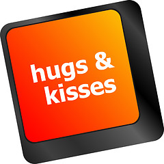 Image showing hugs and kisses words on computer keyboard keys