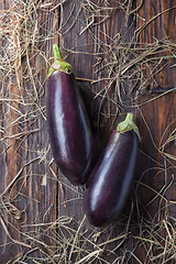 Image showing eggplants on wood