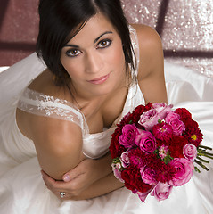 Image showing Above Beautiful Female Bride White Gown Holding Floral Bouquet