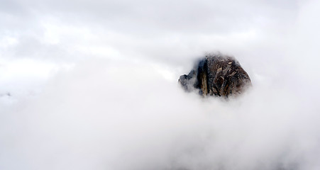 Image showing Clouds and Fog Move in Covering Half Dome Yosemite