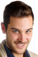 Image showing Smiling young man with blue eyes