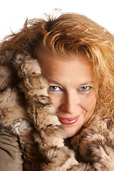 Image showing Blond woman with fur hood