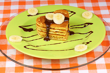 Image showing Heart shaped pancakes with chocolate and banana