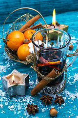 Image showing drink mulled wine on bright blue background.