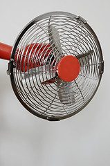 Image showing retro metal fan on neutral background