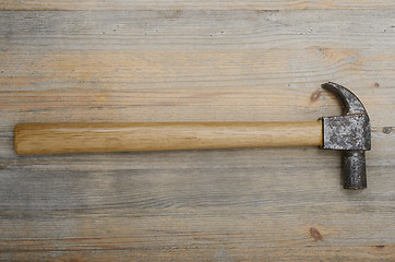 Image showing vintage hammer on a wooden surface