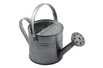 Image showing miniature tin watering can on white