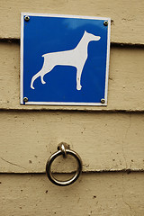 Image showing parking for dogs, steel ring and a sign