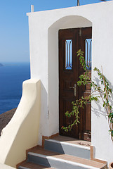 Image showing Brown Door Blue Sky