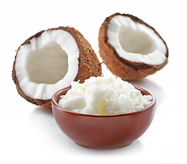 Image showing bowl of coconut oil and fresh coconuts