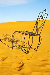 Image showing table and seat in desert  sahara   yellow sand