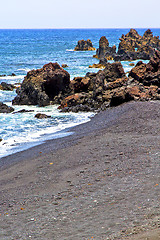 Image showing hervideros brown rock in white coast   water   summer 