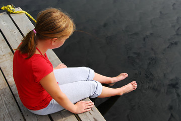 Image showing Girl child dock