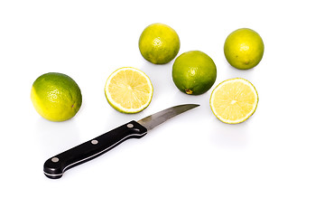 Image showing Knife and green fresh limes 