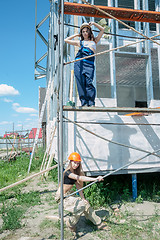 Image showing Two attractive women on construction site