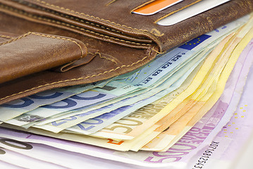 Image showing Leather wallet full of Euro banknotes