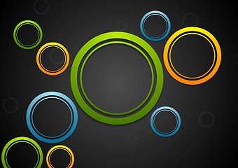 Image showing Colorful circles on dark background