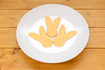 Image showing Three rabbit-shaped biscuits for Easter 