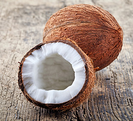 Image showing coconut on old wooden table