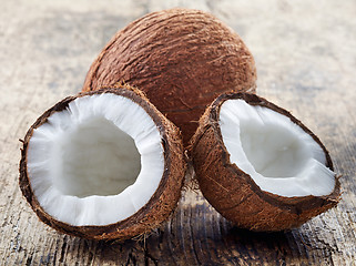 Image showing coconut on old wooden table