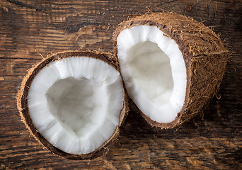 Image showing coconut on old wooden table