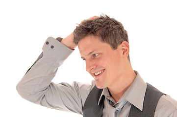 Image showing Man scratching his head.