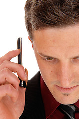 Image showing Man holding cell phone.