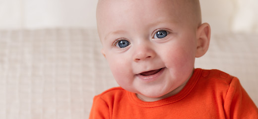 Image showing Close Up Portrait Young Blue Eyed Infant Boy Male Child